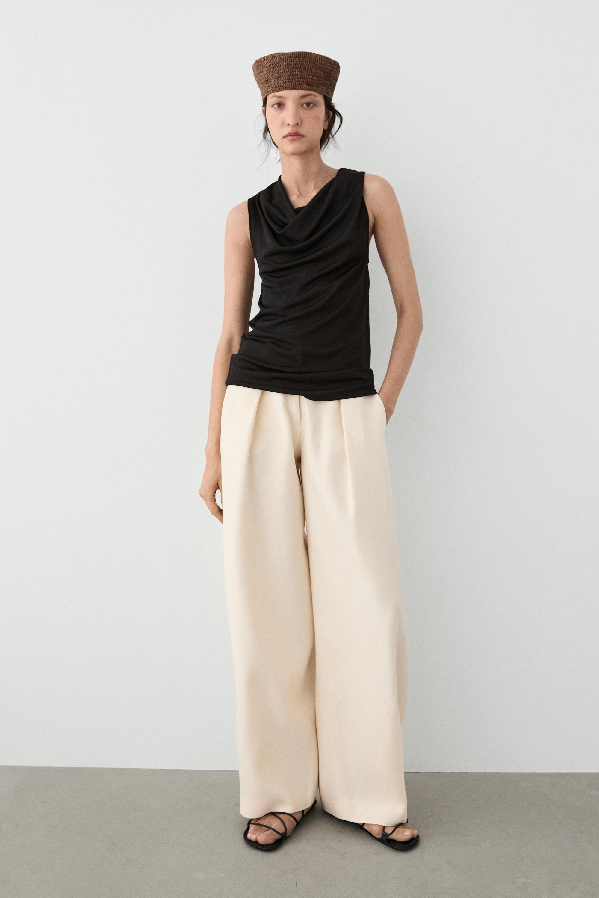 Flowing top with knot detail